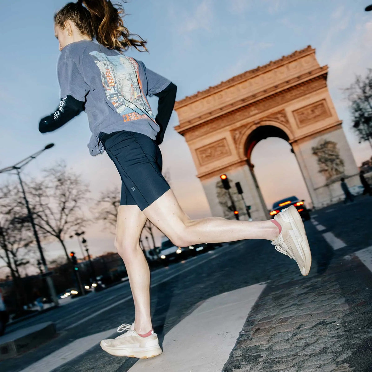 Parley running past the Arc de Triomphe in Paris